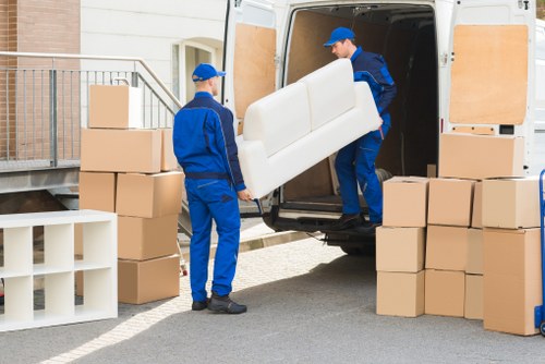 Removal team in Ruislip preparing furniture with safety equipment