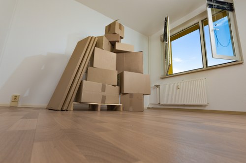 Office relocation planning in Ruislip with packed boxes and workspace equipment