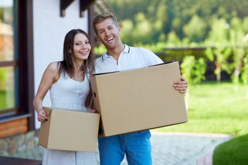 Unpacking service helping a family settle into a Ruislip property