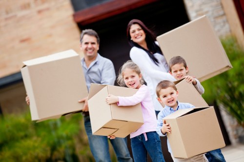 Moving preparation checklist beside stacked boxes for a Ruislip relocation